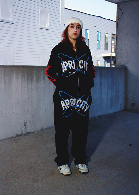 Black Apricity zip-up sweatpants